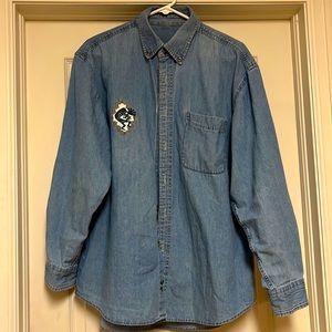 XL Jean shirt with kokopelli on front pocket and on the back of the shirt.